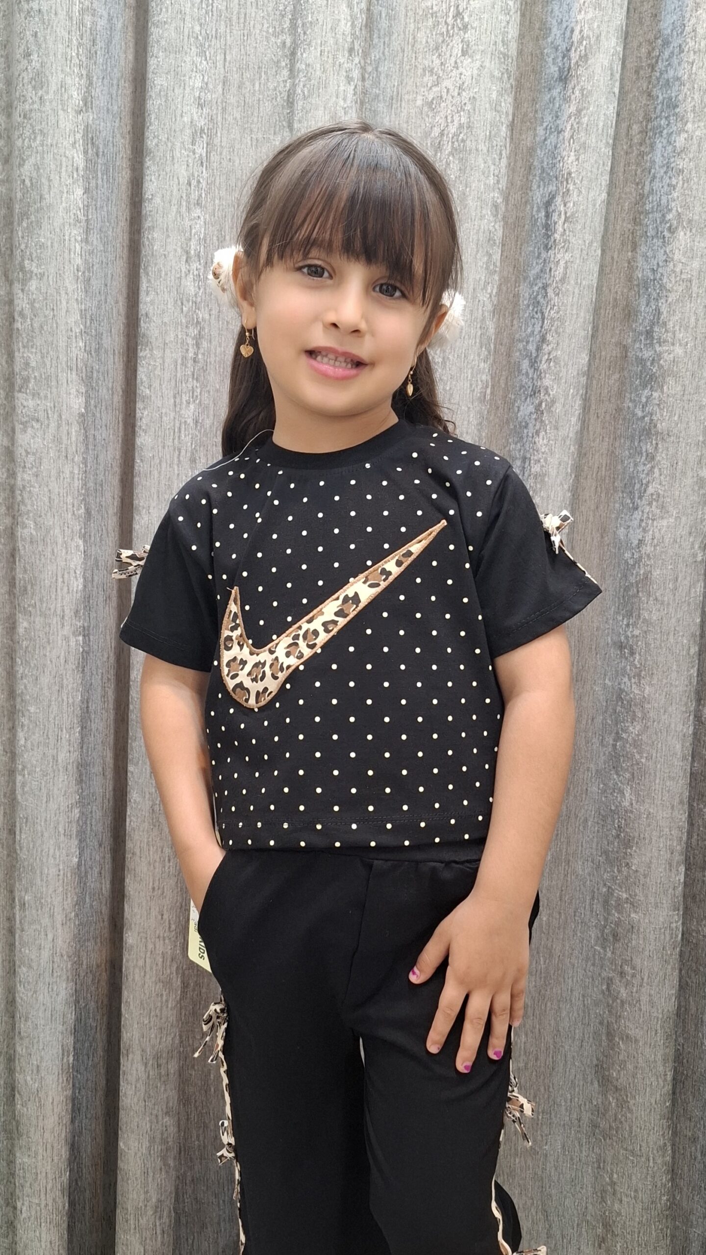 15496 ست تیشرت و شلوار طرح نایک پلنگی و پاپیون(بچگانه) - تصویر 1